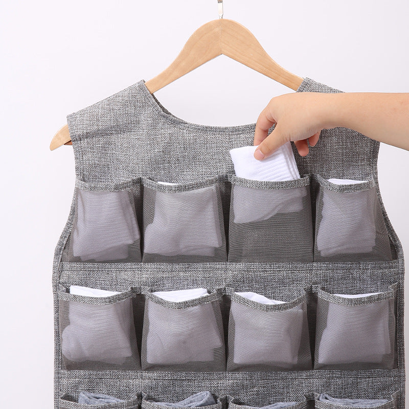 Double-sided hanging storage organizer for underwear and socks—made of Oxford cloth, designed for wall-mounted use.