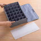 Collapsible fabric storage box for home use—dust-proof, multi-compartment organizer for underwear, socks, and lingerie.